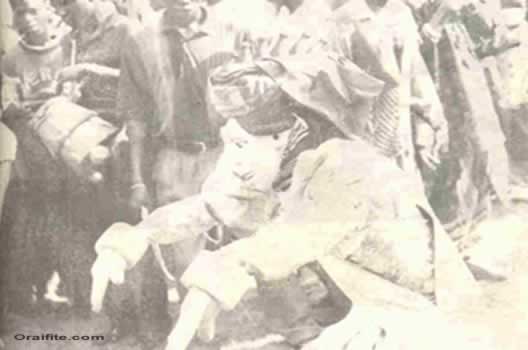 Maiden or Nwunye eze mmuo Mask performing at Burial.
